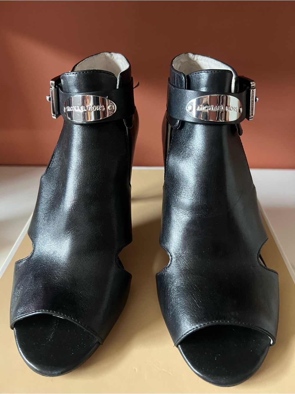 Michael Kors Black Leather Open-Toe Ankle Booties with Silver Plaque